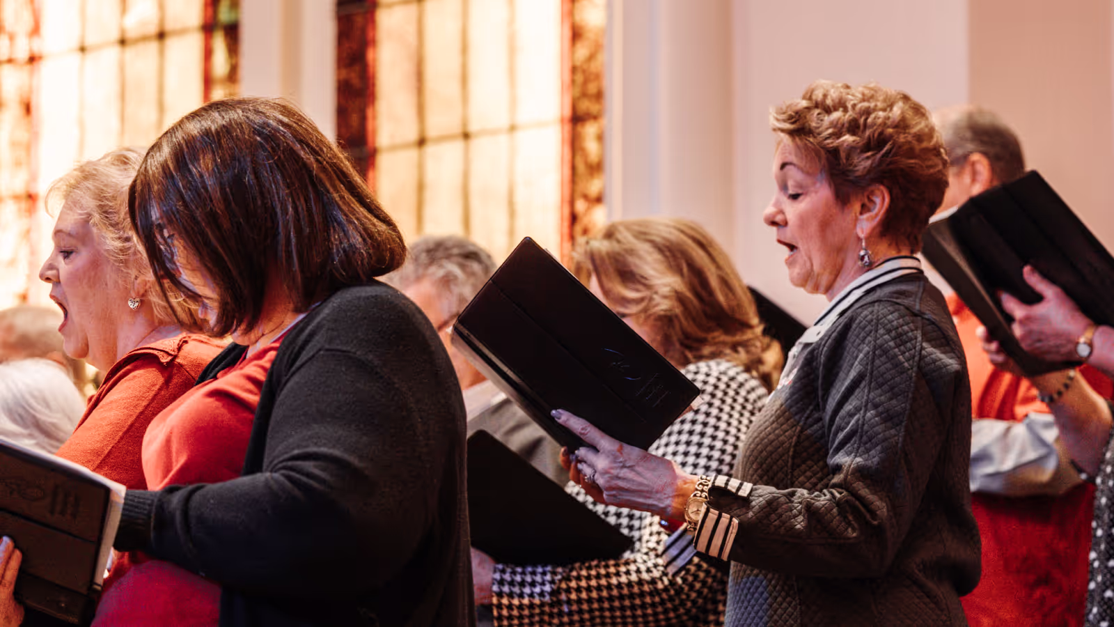 Choir members singing during worship